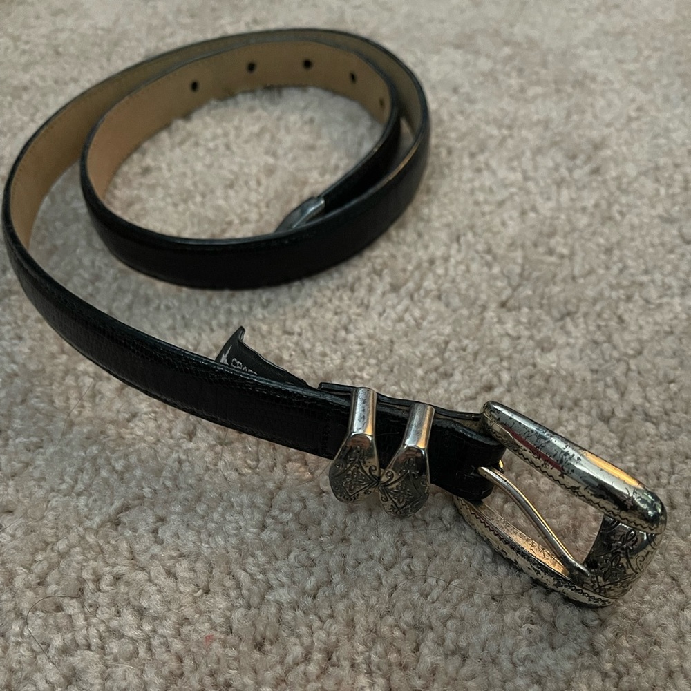 Brighton Belt. Black with slight silver detail. Gently worn.